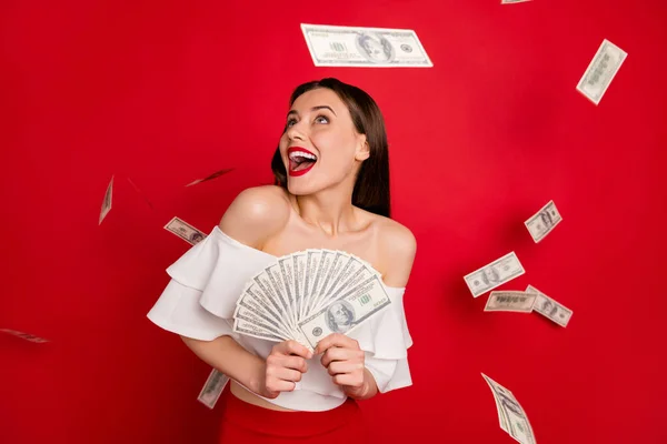 Portrait of lovely person hold cash currency look scream shout dressed white blouse isolated over red background — Stock Photo, Image