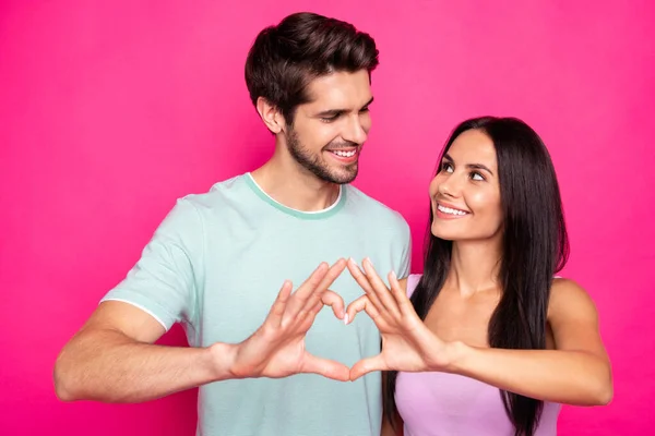 Photo of amazing guy and lady making heart figure with arms expressing feelings looking eyes wear casual outfit isolated pink color background — Stock Photo, Image