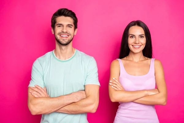 Photo of amazing couple guy and lady standing side by side with crossed arms reliable people wear casual clothes isolated vibrant pink color background — Stock Photo, Image