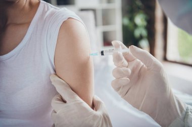 Cropped photo of young sick ill patient lady unwell call emergency ambulance doc virologist flu cold covid injection shoulder medication help wear latex gloves protective uniform indoors clipart