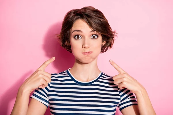 Portrait of careless crazy funky girl inflate her cheeks point index finger show joke wear good look suits isolated over pastel color background — Stok Foto