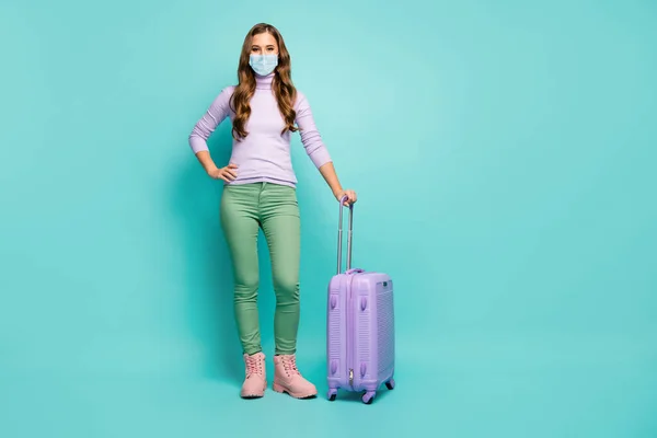 Full length body size view of her she slim pretty girl wearing safety gauze mask departing abroad risk ncov-2 cov mers respiratory prevention isolated green blue teal turquoise color background — Stock Photo, Image