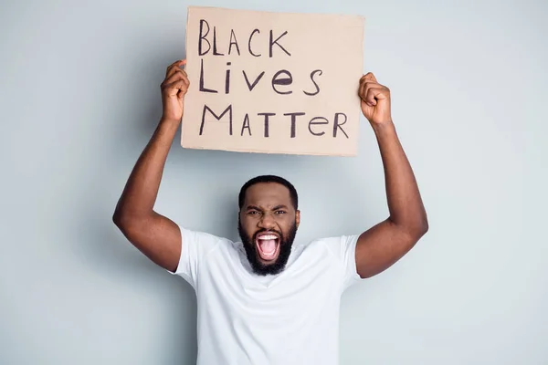Photo of crazy yell dark skin african city protester placard show negative attitude black citizens social lawlessness stop murder black people human concept isolated grey color background — Stock Photo, Image