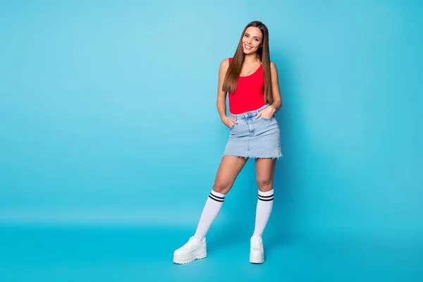 Full length photo of pretty lovely girl enjoy spring weekend holiday free time wear modern beauty style outfit tank-top socks footwear isolated over blue color background — Stock Photo, Image