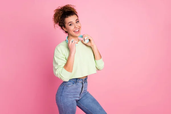 Portrait of pretty teen girl have modern technology wireless headphones enjoy listen pop star disco music wear good look clothes isolated over pastel color background — Stock Photo, Image