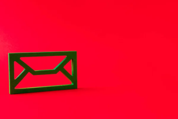 Close-up view of green mailbox figure connecting people worldwide net work corporate contact isolated over bright vivid shine vibrant red color background — Stock Photo, Image