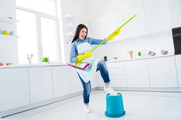 Full length body size view of her she nice attractive funny funky cheerful excited cheery housewife wiping floor playing mop like guitar having fun fooling in modern light white interior kitchen house — Stock Photo, Image