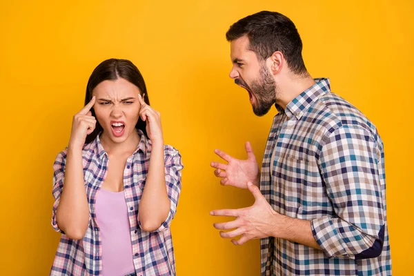 Aggressive man have disagreement with his sweetheart shout she touch forehead finger avoid misunderstanding wear checkered clothes isolated over shine color background — Stock Photo, Image