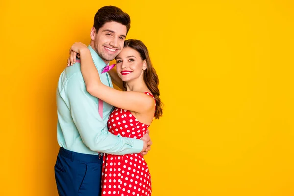 Profile photo two people pretty lady handsome guy prom party couple hugging posing portrait wear red dotted dress shirt bowtie retro clothes isolated yellow bright color background — Stock Photo, Image