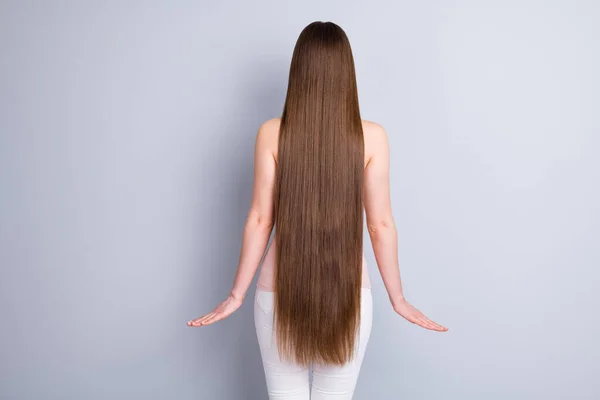 Rear back behind view photo of perfect model lady demonstrating ideal neat long hairstyle after salon procedure wear singlet trousers isolated grey color background — Stock Photo, Image
