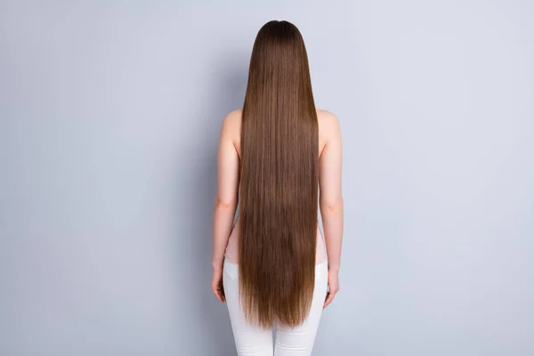 Rear back behind view photo of perfect model lady demonstrating ideal neat long hairstyle after salon procedure treatment wear singlet trousers isolated grey color background — Stock Photo, Image