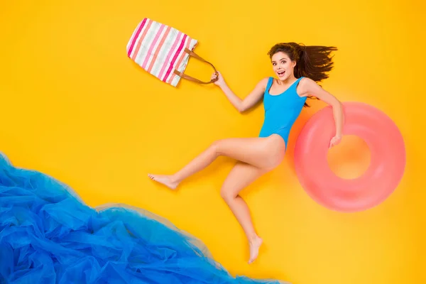 Top view above high angle flat lay flatlay lie concept full length body size view of attractive glad cheery girl spending time plage ocean isolated bright vivid shine vibrant yellow color background — Stock Photo, Image