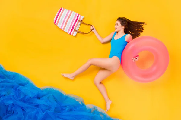 Visão superior acima de alto ângulo flat lay flatlay lie concept full length body size view of attractive thin cheery girl enjoying plage river bank isolated bright vivid shine vibrant yellow color background — Fotografia de Stock