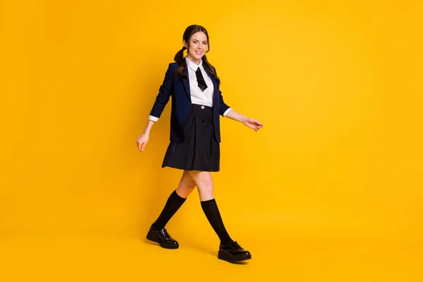 Full length body size view of her she nice attractive lovely cheerful schoolgirl going back to school autumn fall new semester season isolated on bright vivid shine vibrant yellow color background — Stock Photo, Image