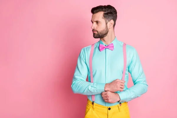 Profile side photo of masculine charming attractive man fix correct button sleeves prepare party dress code wear good look clothes isolated over pastel color background — Stock Photo, Image