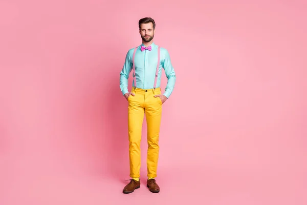 Full length body size view of his he nice attractive imposing elegant fashidy fashidy content bearded guy artist holding hands in pockets isolated over pink pastel color background — стоковое фото