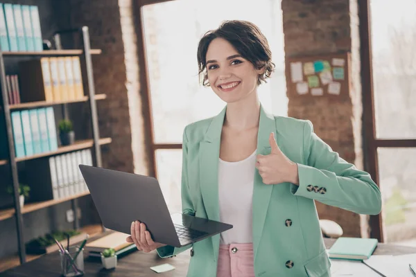 Photo of beautiful business lady hold notebook chatting colleagues raise thumb finger up insurance agent home remote work wear blazer near table modern interior home office indoors — Stock Photo, Image