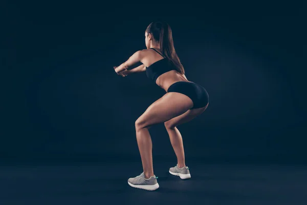 Full size rear photo short sport suit lady practicing body weight workout sit ups improve butt muscle isolated black background — Foto de Stock