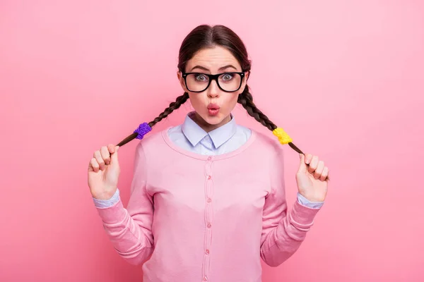 Close-up portrait of her she nice attractive pretty lovely positive funny amazed brown-haired teen girl having fun touching tails pout lips isolated pink pastel color background — Stock Photo, Image