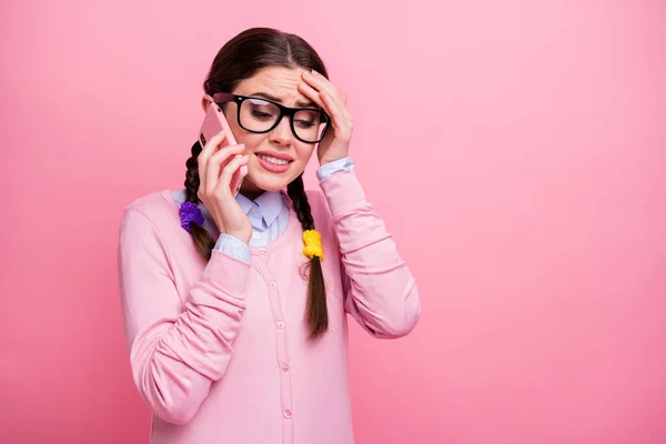 Close-up portrait of her she nice attractive pretty worried shy terrified depressed smart clever girl geek calling operator roaming service abroad discussing isolated over pink pastel color background — Stock Photo, Image