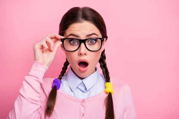 Close-up portrait of her she nice-looking attractive lovely pretty amazed brown-haired teen girl geek touching specs message information news reaction isolated over pink pastel color background — Stock Photo, Image