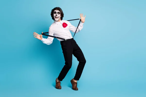Full length body size view of his he handsome cheerful cheery comic playful gentleman mc artist having fun pulling suspenders dancing fooling isolated bright vivid shine vibrant blue color background — Stock Photo, Image