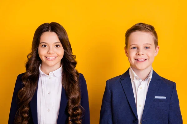 Close-up portrait of her she his he nice attractive cheerful content pupils learners back to school new academic year autumn semester isolated over bright vivid shine vibrant yellow color background — Stock Photo, Image