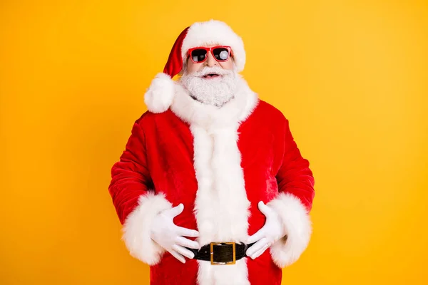 Portrait of his he nice funny glad cheerful cheery white-haired Santa big belly stomach abdomen laughing ho-ho having fun isolated bright vivid shine vibrant yellow color background — Stock Photo, Image