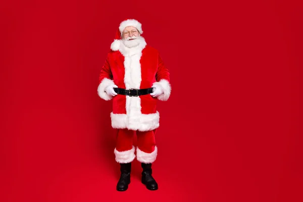 Full length body size view of his he nice attractive handsome content kind cheery Santa father wearing festal winter season look outfit newyear isolated bright vivid shine vibrant red color background — Stock Photo, Image