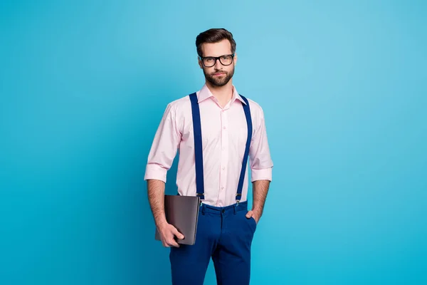 Photo of handsome confident business man guy work computer quarantine stay home online meeting working internet wear specs shirt suspenders pants isolated blue color background — Stock Photo, Image