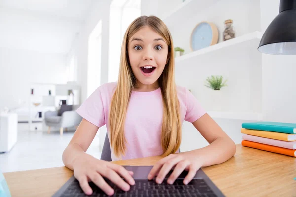 Close up photo of excited little kid girl sit comfort cozy table study remote use laptop video call wrażenie nauczyciel mówić dobre oceny egzamin wpisując w domu w pomieszczeniach — Zdjęcie stockowe