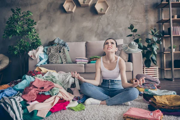 Full body photo of annoyed irritated girl house wife order wardrobe discover many dirty dressing clothes scream look sit floor carpet legs crossed folded in house indoors — Stock Photo, Image
