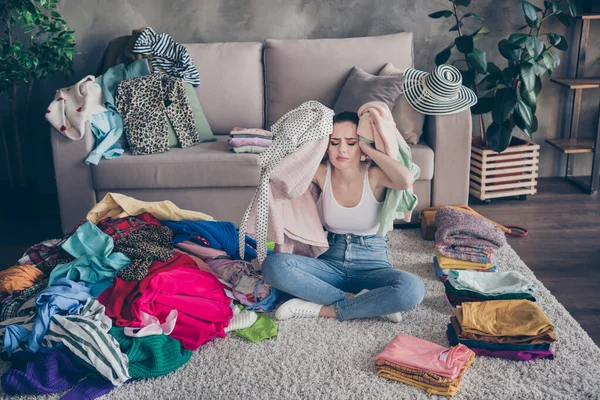 Photo of pretty stressed crying lady stay home quarantine many clothes heap stack floor wardrobe stuff pick select date outfit nothing to wear concept date preparation living room indoors — Stock Photo, Image