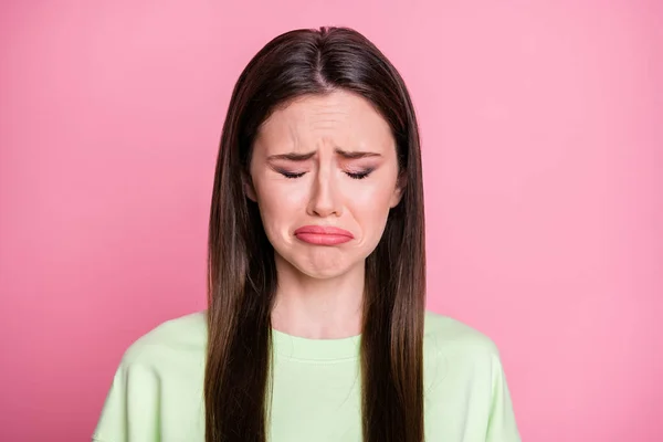 Closeup photo of depressed lady straight long hairdo disappointed stay home alone crying loneliness concept wear casual green sweatshirt pullover isolated pink pastel color background — Stock Photo, Image