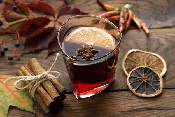Mulled wine with citrus fruits and spices. Winter grog with orange, cinnamon and anise