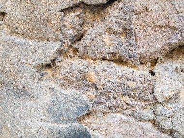 Eski taş duvar dokusu arkaplanının yakınlaştırılması