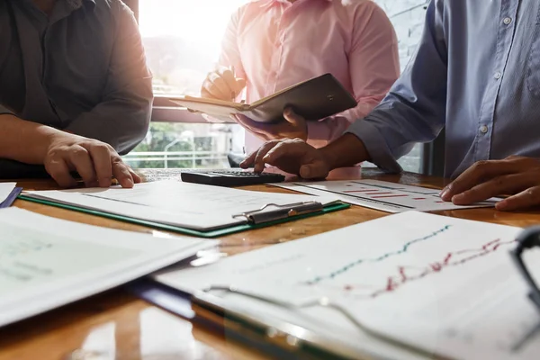 Business team meeting and discussing project plan. Businessmen discussing together in meeting room. Professional investor working with business project together. Finance managers task.