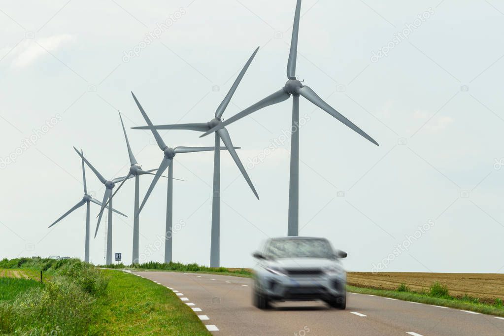 Wind turbines of a power plant for electricity generation close 
