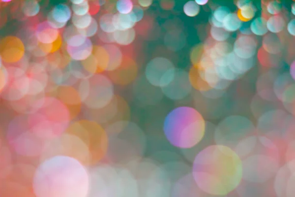 Abstração bokeh colorido em um fundo escuro. Desfocado . — Fotografia de Stock