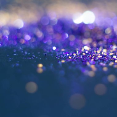 Mavi bir arka plan üzerinde soyutlama turuncu bokeh. Defocused.