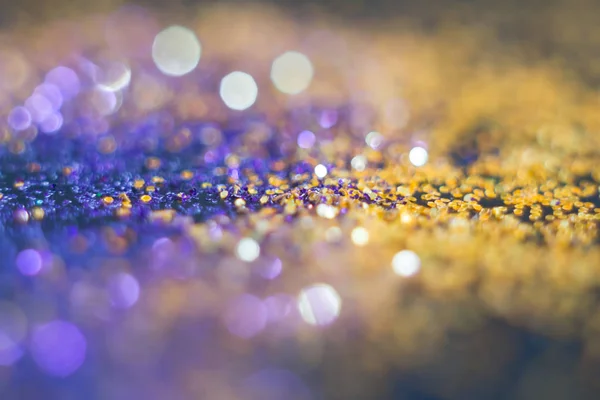 Mavi bir arka plan üzerinde soyutlama turuncu bokeh. Defocused.