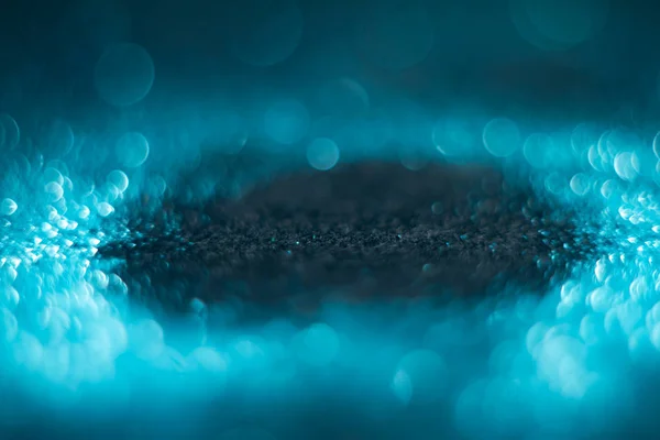 Blue abstract bokeh on a black background. Defocused. — Stock Photo, Image