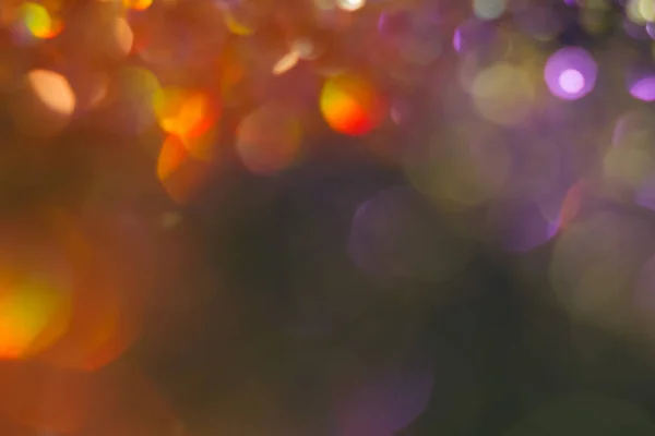 Abstractie kleurrijke bokeh op een donkere achtergrond. Intreepupil. — Stockfoto