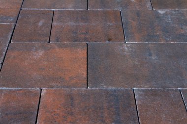 Arka plan çok renkli bir kaldırım taşı üzerinden. Metin için boş alan.