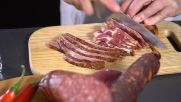 Smoked meat cut with a knife — Stock Video