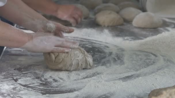 Baker kneads dough on bread. slow motion — Stock Video