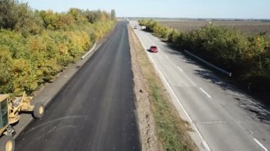 Ukrayna, Dnipro - 11 Ekim 2018: Yol Örgütü karayolu onarım taşır. Hava anket editoryal