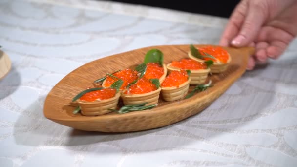 Tartlets with caviar on the table — Stock Footage Tartlets with caviar on the table Royalty Free Stock Footage