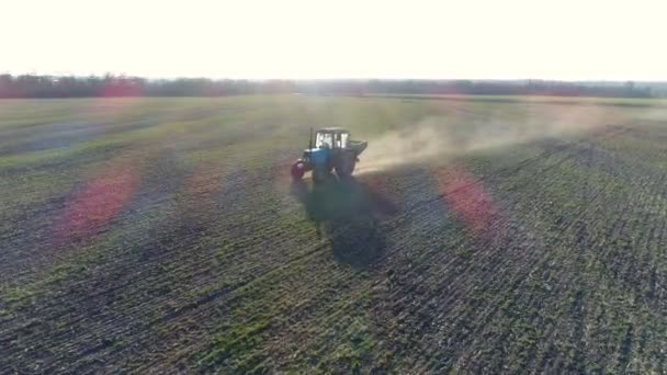 Tractor makes fertilizer. Aerial survey — Stock Video