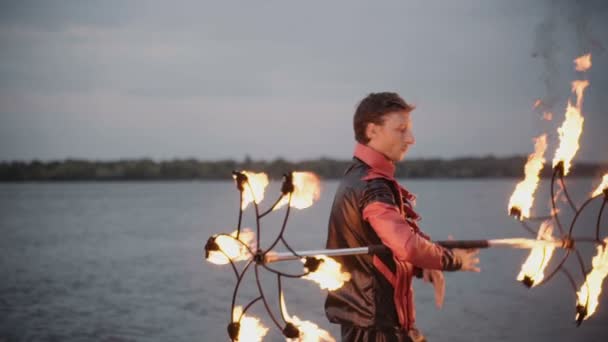 Man with torch fire show. slow motion — Stock Video